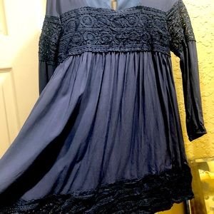 Navy tunic with navy lace overlay on top and bottom.